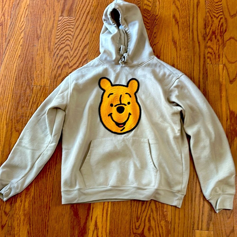 New, worn once. Winnie the Pooh sweatshirt purchased at Disneyland.